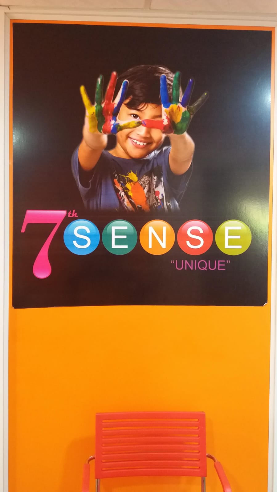 7th Sense Academy branding wall